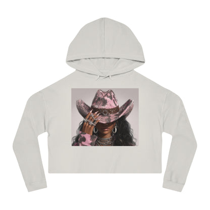 Light gray cropped hoodie with a graphic of a person wearing a pink cowboy hat on a white background