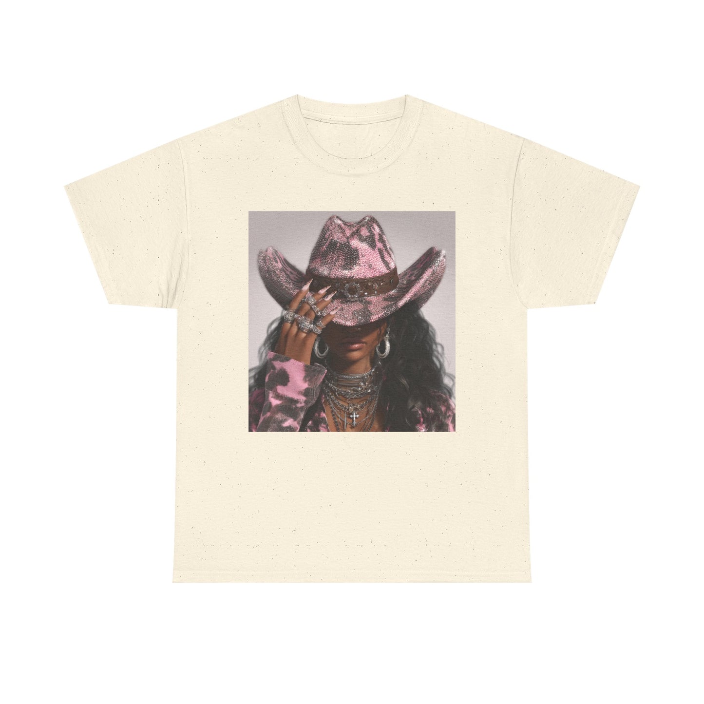 Beige t-shirt with a graphic of a person wearing a cowboy hat on a white background