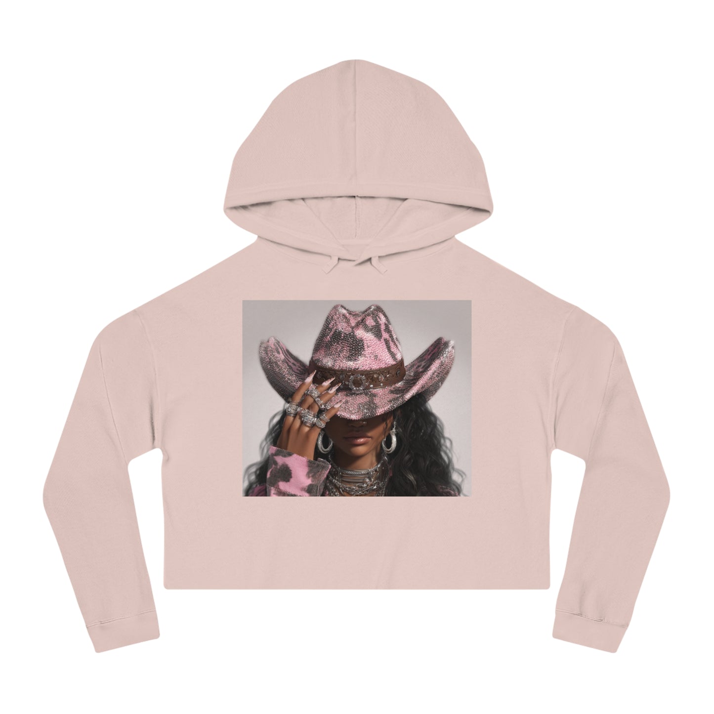Pink cropped hoodie with a graphic of a person wearing a pink cowboy hat on a white background