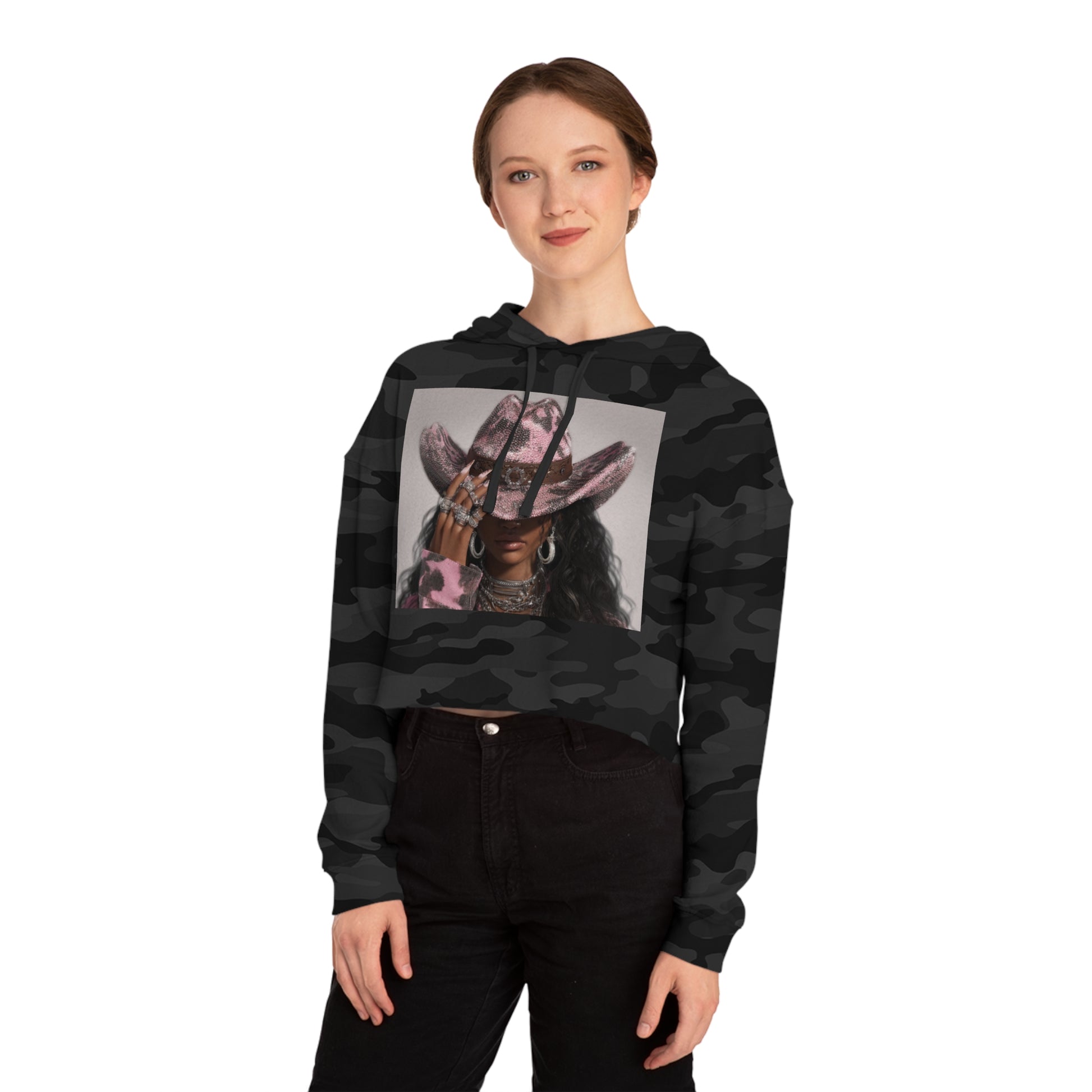 Person wearing a black camouflage hoodie with a graphic design on a white background