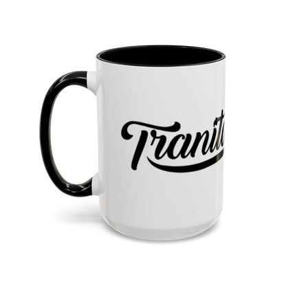 White mug with black interior and handle, featuring the word 'Transit' in black lettering on a white background.